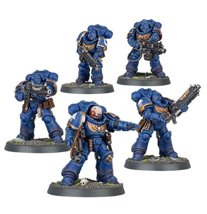 Warhammer 40.000 Space Marines Heavy Intercessors met bolterwapens en zwaar bepantsering, klaar voor de strijd.