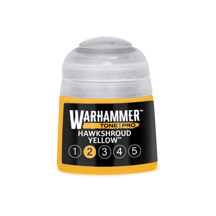 Gele verf van Warhammer Colour Tone Pro Hawkshroud Yellow in een 212ml fles, geschikt voor miniaturen en modelbouw.