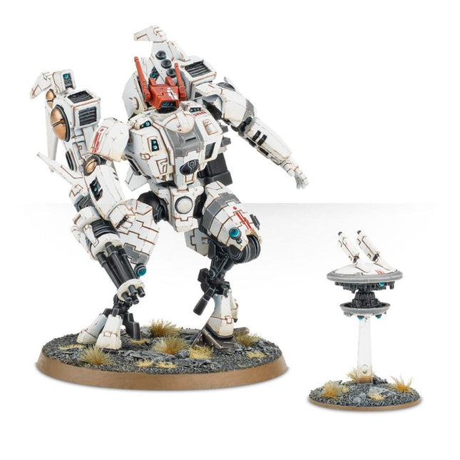 Tau Empire Commander uit Warhammer 40.000, Xenos model met gedetailleerde uitrusting en Cold Star armor, poseert in actie.