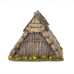Miniatuur Dark Age Huts van Victrix, gedetailleerde modelhuisjes voor historische diorama's en oorlogsspellen.