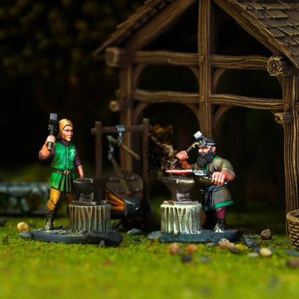 Miniatuurset van twee elfen en dwergen van Wargames Atlantic, zwartsmidfiguren met gedetailleerde wapens en uitrusting.